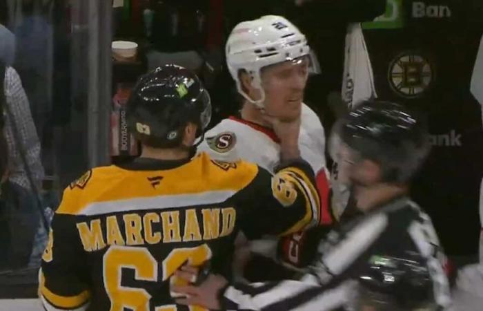 WATCH: Brad Marchand takes an opponent by the throat