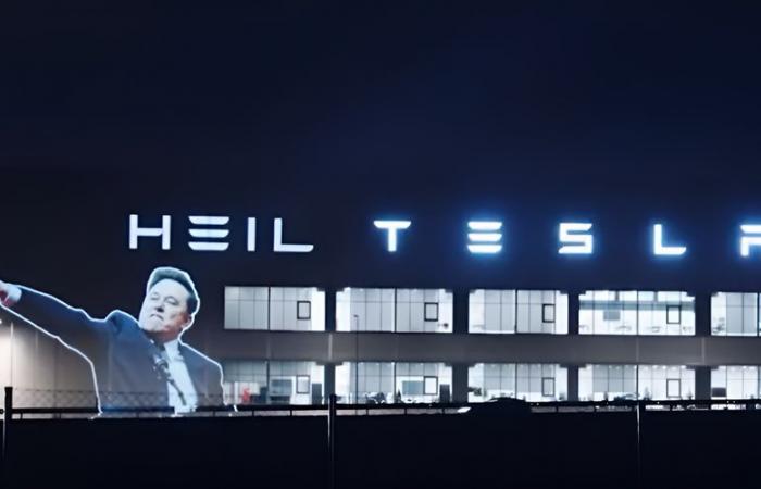 “Heil Tesla”: Activists project Elon Musk’s Nazi salute onto his factory in Germany