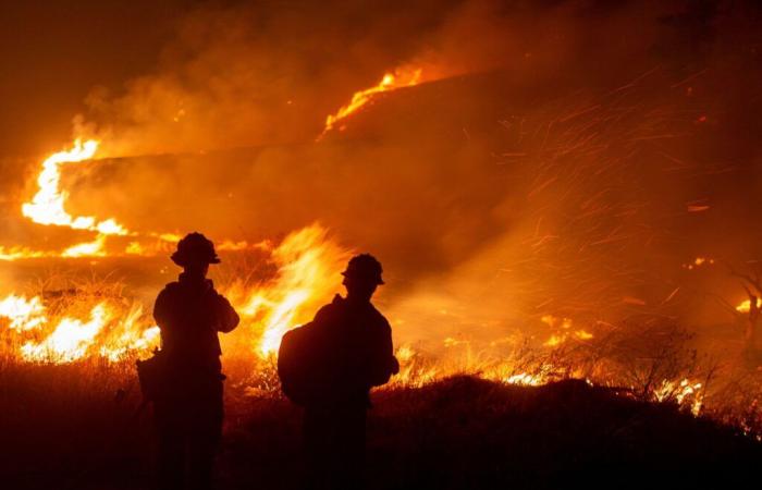 Los Angeles flames spread to Santa Clarita, fire “out of control”