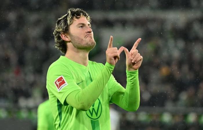 Kiel hit back in roller-coaster draw at Wolfsburg