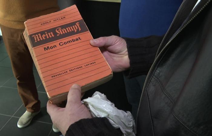 An original edition of Mein Kampf, Adolf Hitler's book, discovered by Emmaus companions