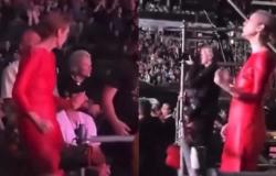 Celine Dion dances with her sons at the Rolling Stones concert