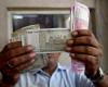 Rupee settles on flat note, higher by 2 paise at 83.50 against US dollar
