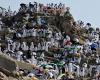 tide of worshipers at Mount Arafat in extreme heat