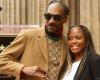 Matching in their pink jogging pants, Snoop Dogg and his wife, Shante Broadus, celebrate their 27th wedding anniversary