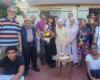 A centenarian celebrated by her neighbors