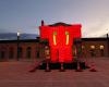 The visual artist Bibi poses a red elephant in Bourg-en-Bresse