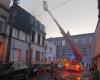 a squatted house ravaged by flames, a local resident testifies.