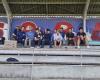 young people painted a fresco on a stadium stand in Sarlat