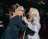 Adele hugs Meryl Streep during a concert, in an outfit paying tribute to the actress