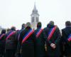 elected officials demonstrate in front of the prefecture against the savings in the finance bill