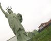 she installs a giant replica of the Statue of Liberty in her garden