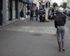 in the 19th arrondissement of Paris, employees escorted by security guards to public transport