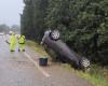 a vehicle ends up on its roof, a young person seriously injured