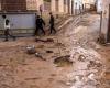 He loses his car in the floods, his employer threatens to fire him because he arrived late for work