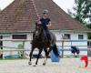 Estelle “whispers” in the ears of the horses in her new equestrian center