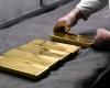 Gold hovers around one-month low ahead of US economic data, Fed comments