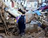 the bodies of two young brothers found two weeks after the floods