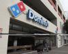 Warren Buffett takes a stake in Domino's Pizza, whose shares are climbing on Wall Street