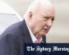 Alan Jones arrested over indecent assault allegations