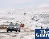 UK weather: snow and ice warning as commuters face widespread disruption | UK weather