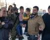 families celebrate their return to Aleppo, Syria's second city that fell into the hands of rebels and jihadists