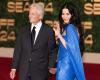 On the arm of Michael Douglas in Jeddah, Catherine Zeta-Jones turns heads in her azure cape dress