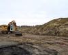 What monumental project of the Metropolis is hidden behind the earth mounds of Avenue d'Atlanta, in Toulouse