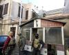 the tricolor flag hoisted over the French embassy in Damascus