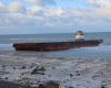 The barge stranded in Sotteville-sur-Mer after the storm has left