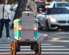 a food delivery robot was hit by a robot taxi