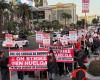 Culinary Union members march from The Strip to Virgin