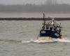 A fishing boat overturns, the body of a sailor fished out at sea