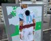 Why do giant stickers bearing the image of Dimitri Payet adorn trash cans in Nice?